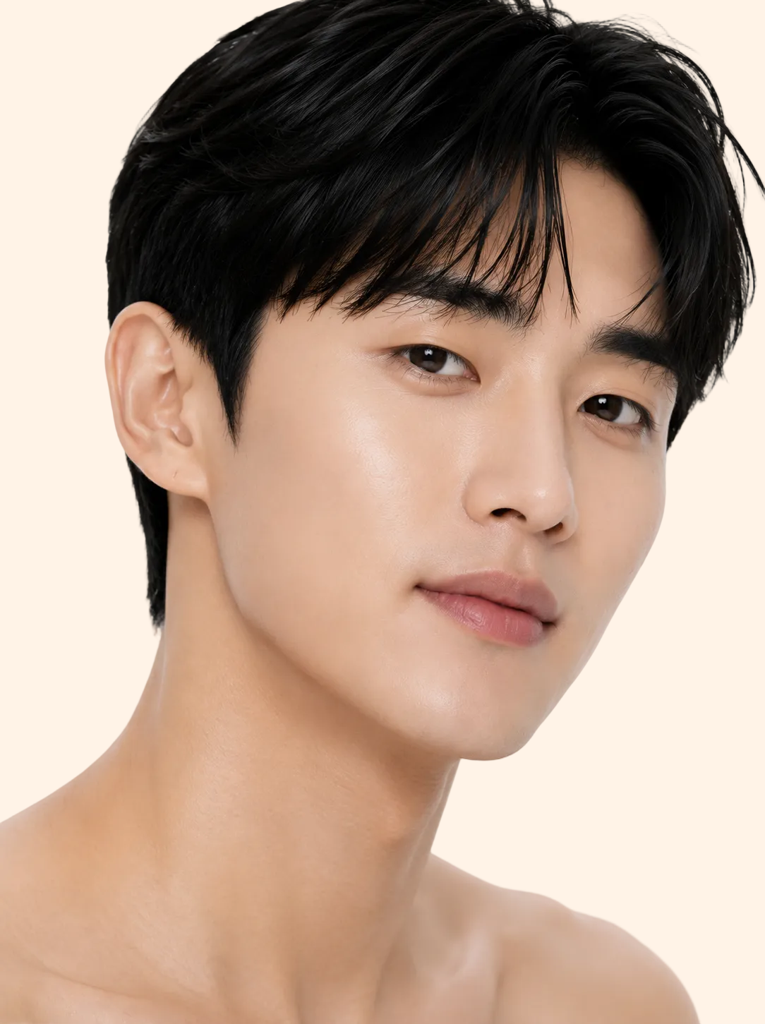 Man with short black hair against a white background