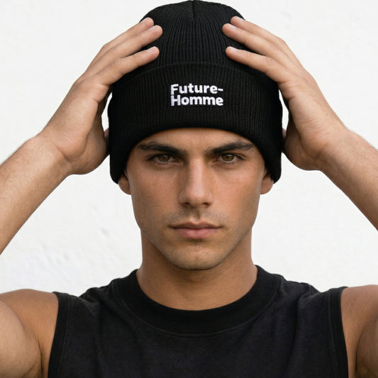 Man wearing a black beanie with 'Future Homme' text against a white background