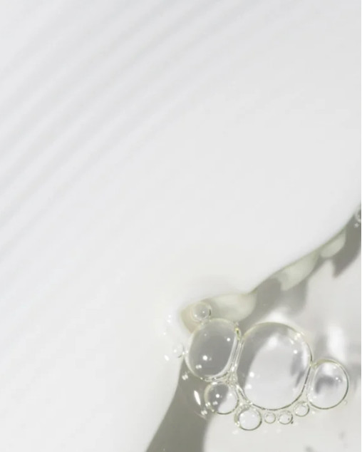 Up close image texture of the Future-Homme plus skin anti age day cream product. 