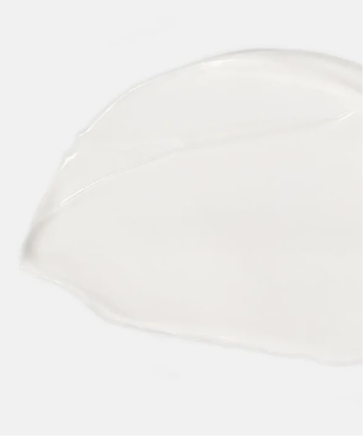 A smear of white product on a white background. 