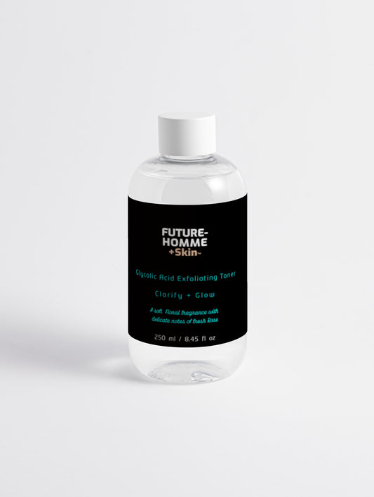 A clear bottle with black label of the Future-Homme Plus skin Glycolic Acid Exfoliating Toner on a white background. 