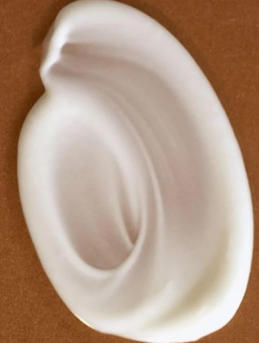 Sample texture of the Future-Homme Plus Skin Hyaluronic Acid Face Cream on a skin background. 