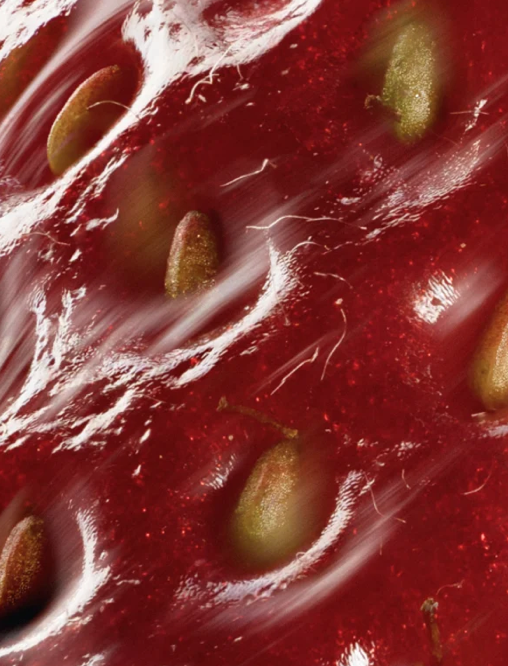Close up of red fruit sample for the Future-Homme plus skin peptide anti-age serum.