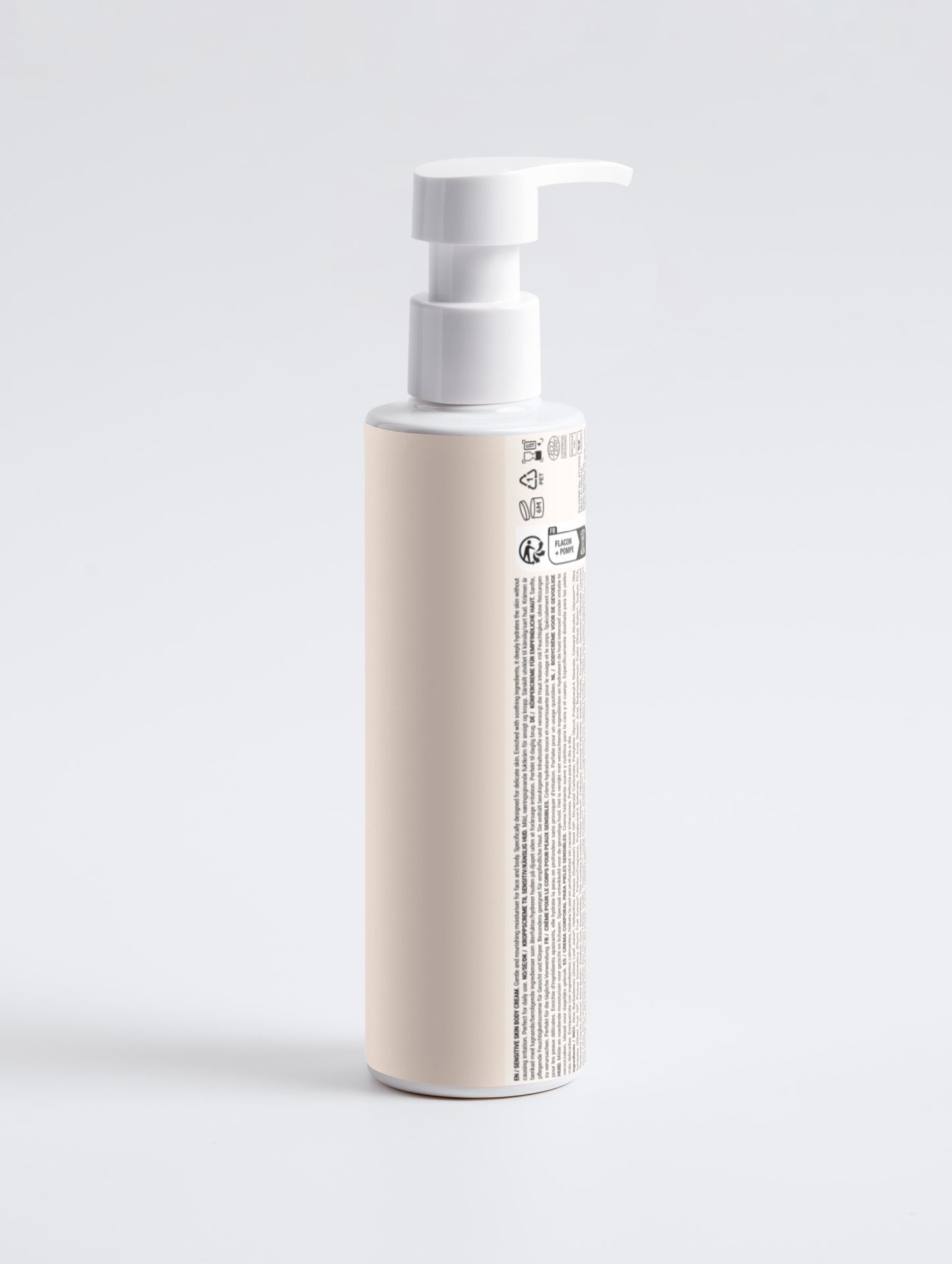 Skincare bottle with pump dispenser on a light gray background