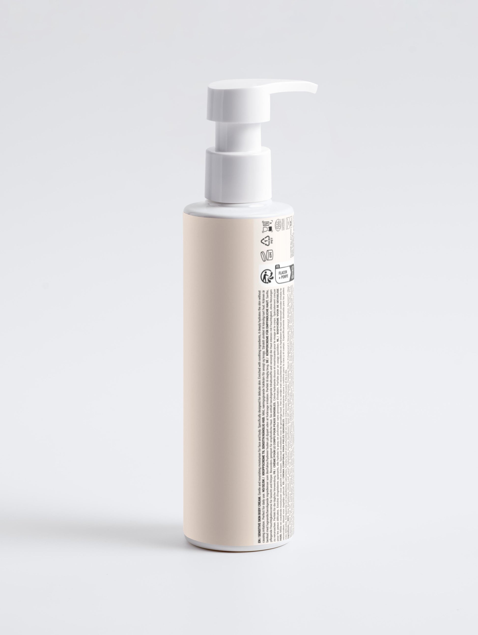 Skincare bottle with pump dispenser on a light gray background