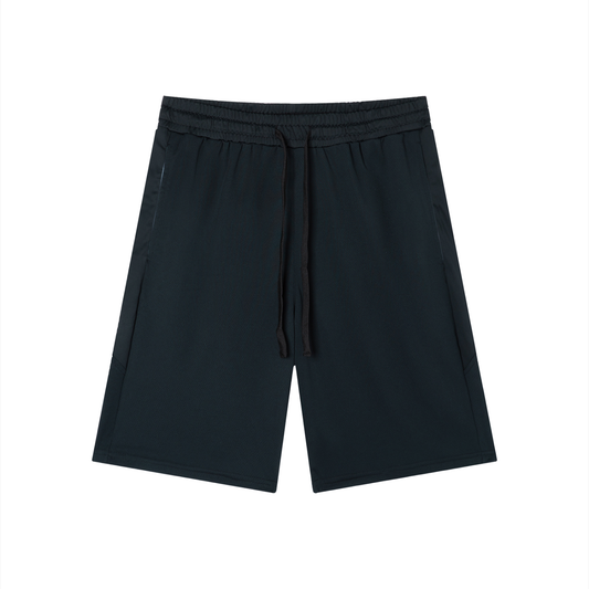Black shorts with a drawstring on a white background