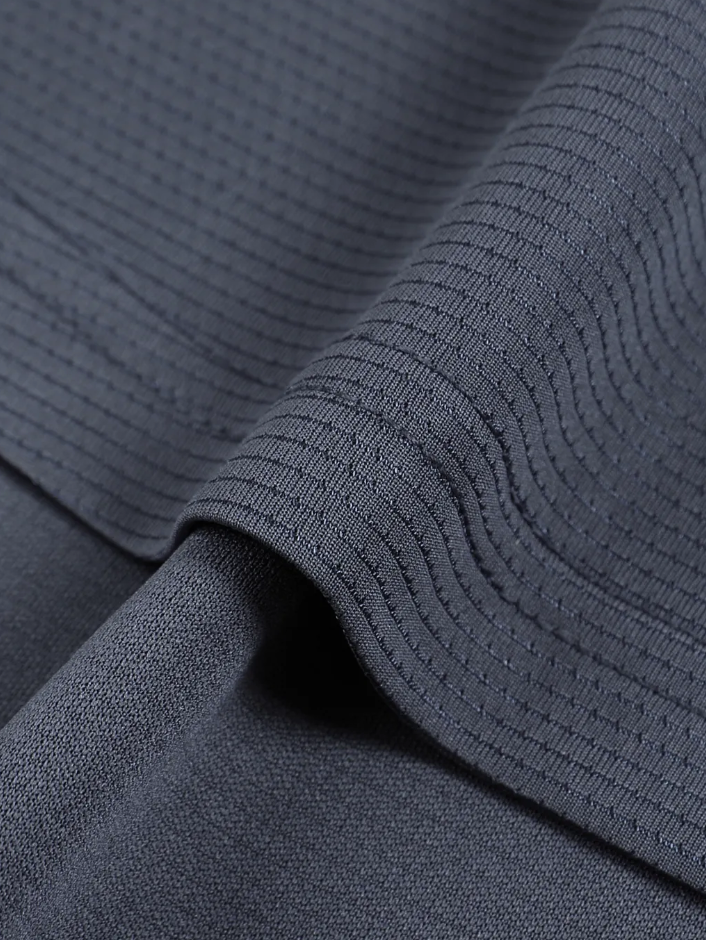 Close-up of textured dark gray fabric
