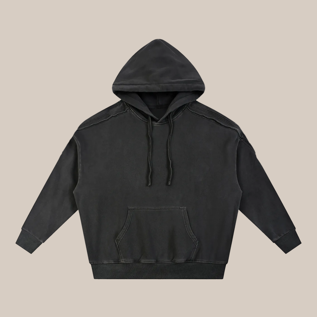 Black hoodie on a beige background