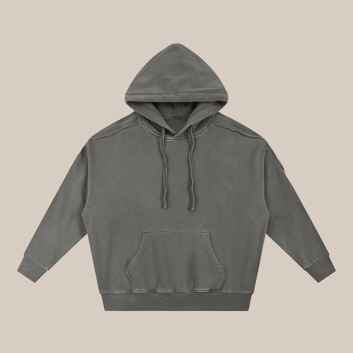 Dark gray hoodie flat lay on a beige background. 