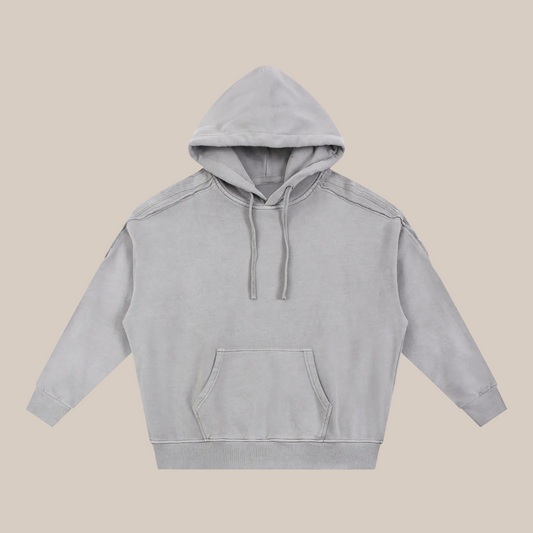 Gray hoodie on a beige background