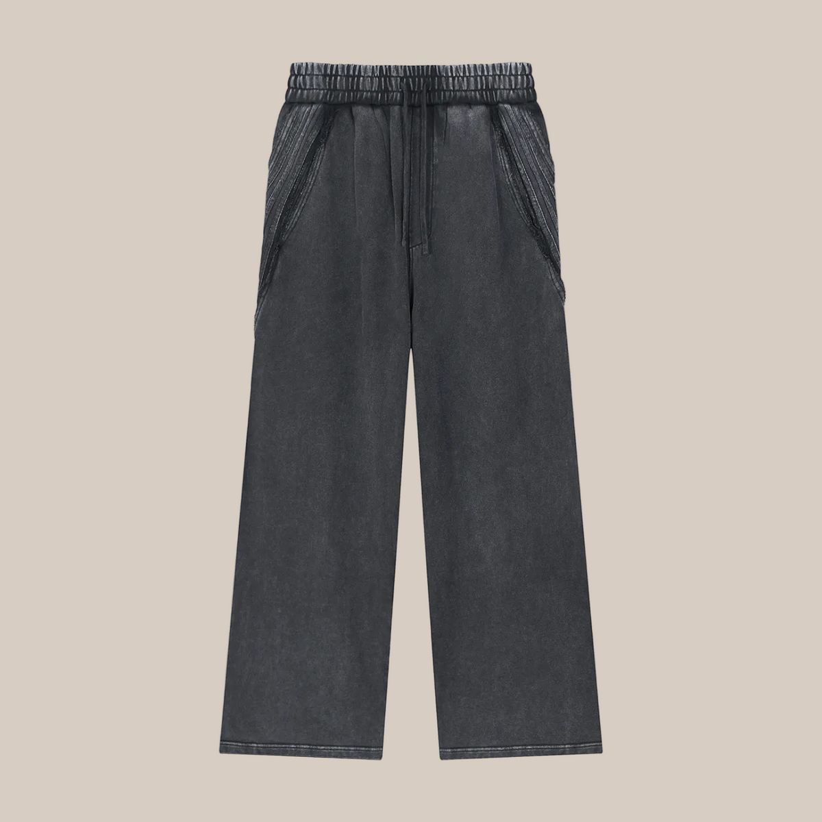Black pants on a beige background