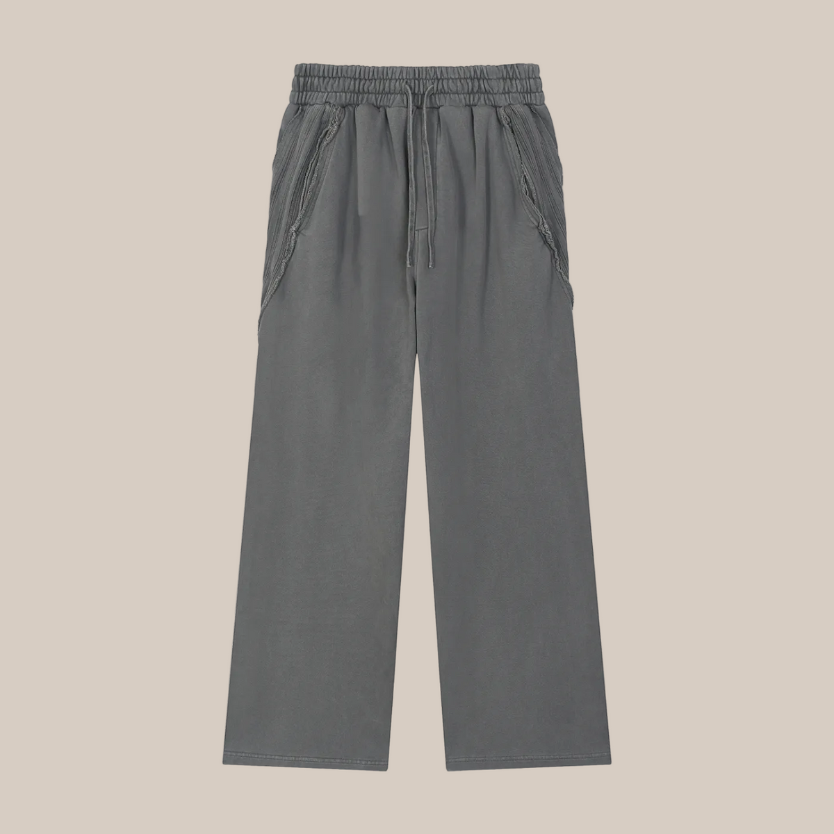 Gray pants on a beige background. 