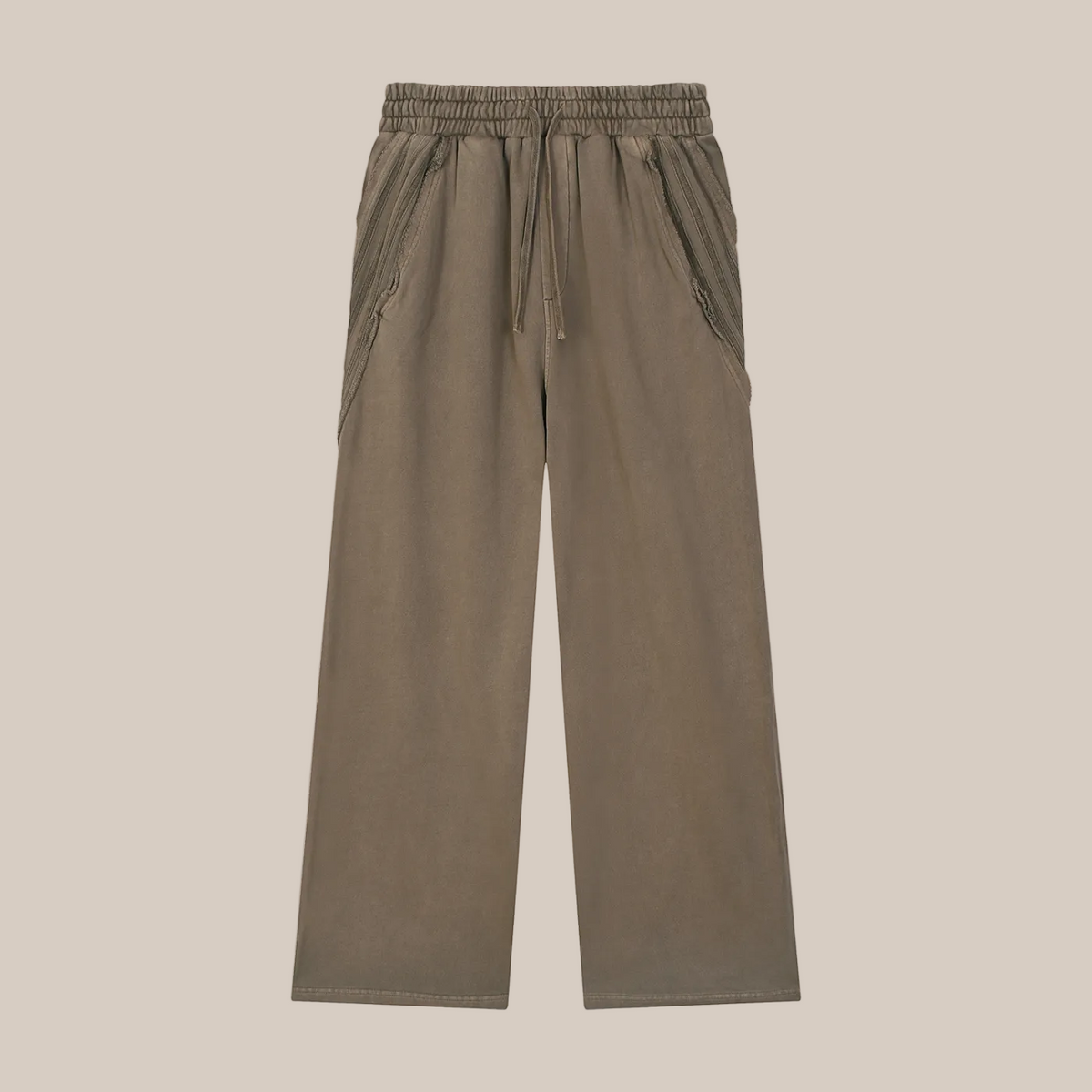 Brown pants on a beige background