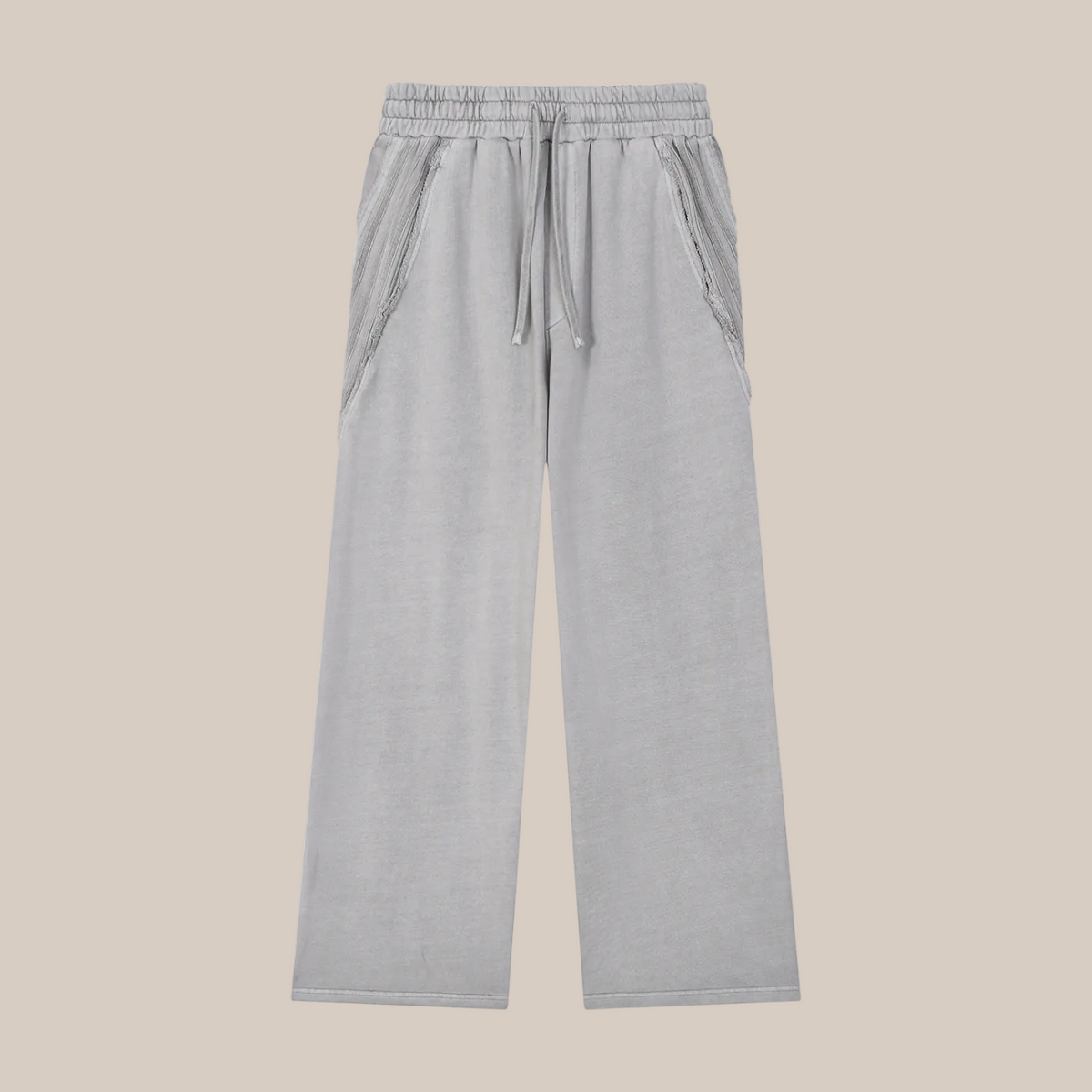 Gray pants on a beige background. 
