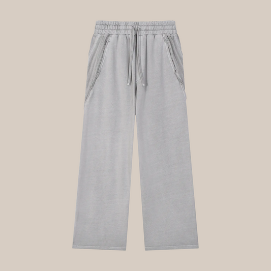 Gray pants on a beige background. 