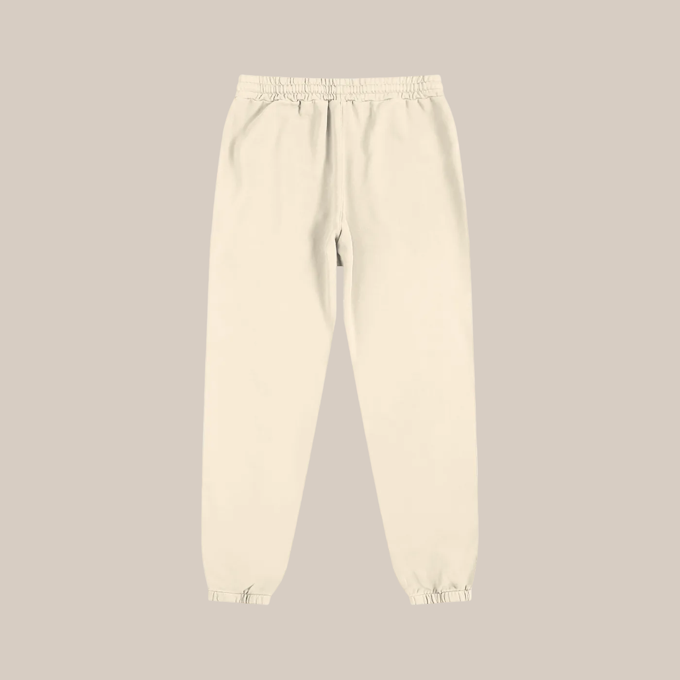 Beige sweatpants on a beige background