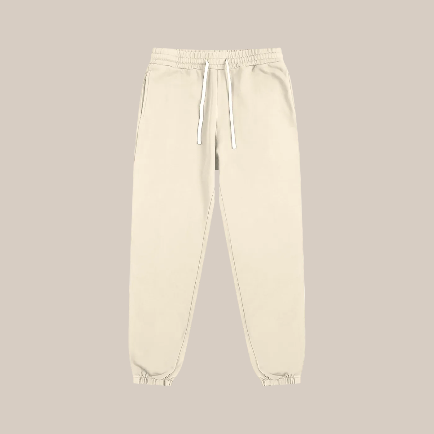 Beige sweatpants on a beige background