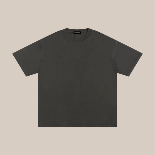 Plain black t-shirt on a beige background