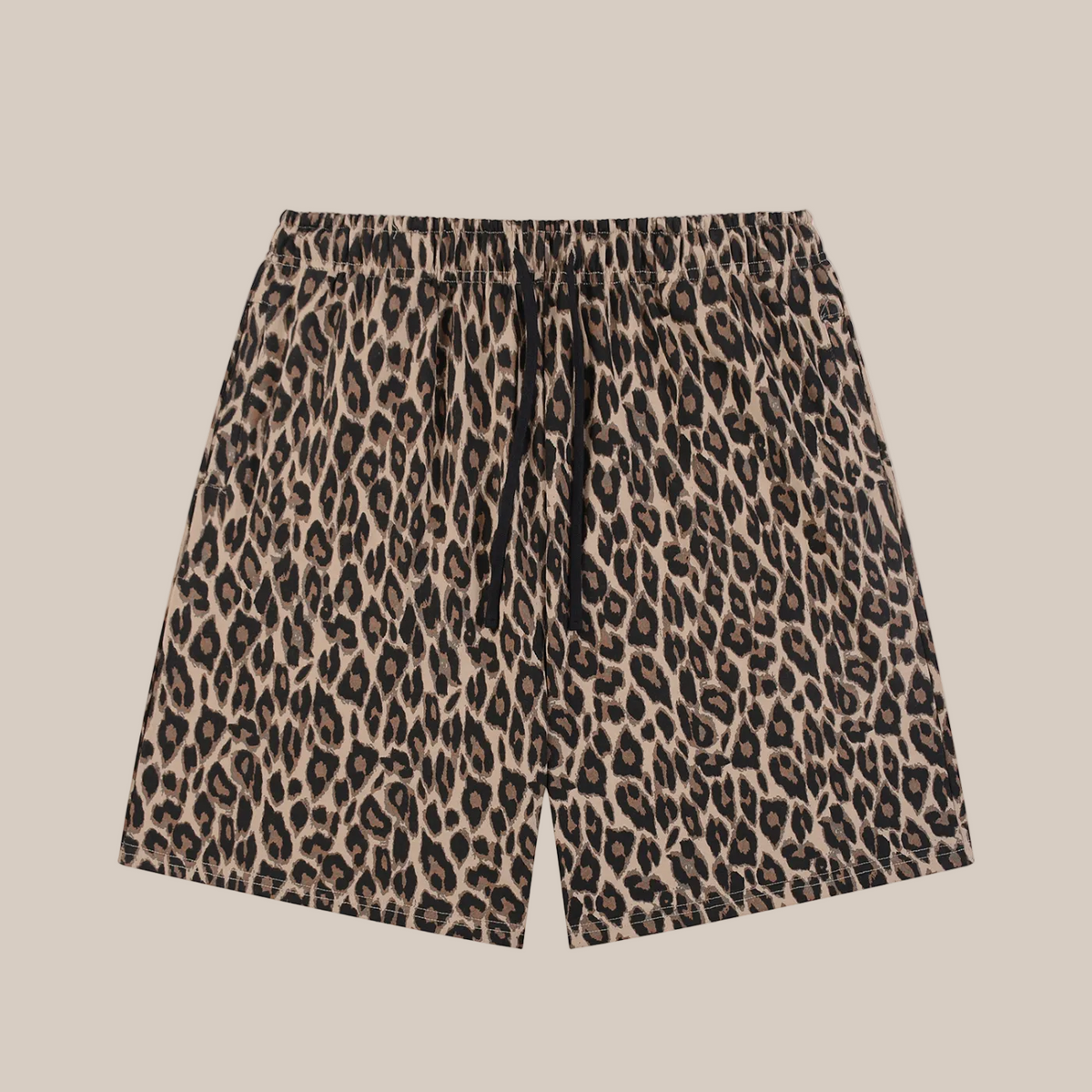 Leopard print shorts on a beige background