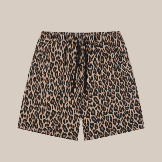 Leopard print shorts on a beige background
