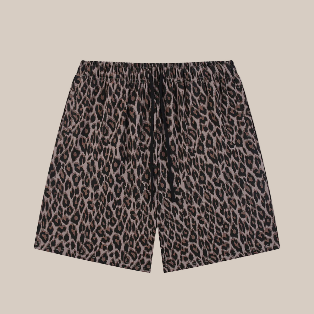 Leopard print shorts on a beige background