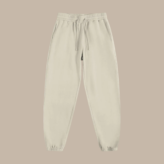 Beige sweatpants on a beige  background