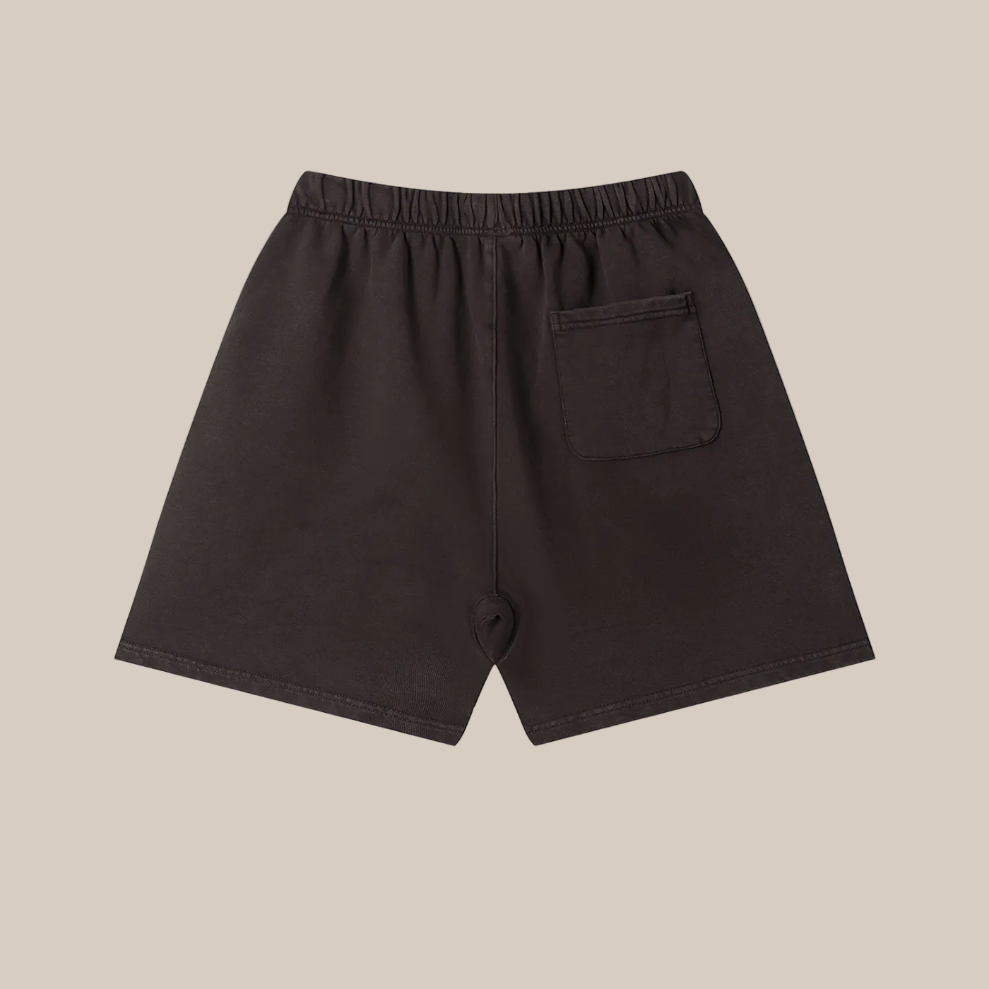 Dark purple shorts with a pocket on a beige background