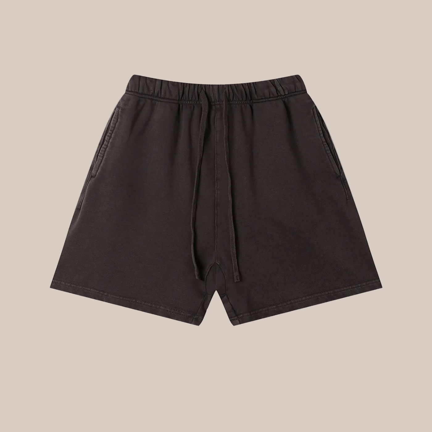 Dark purple short flat lay on a beige background