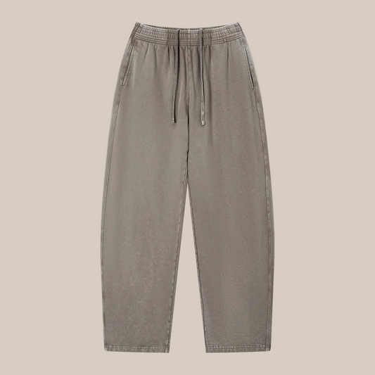 Beige pants with drawstring waist on a beige background