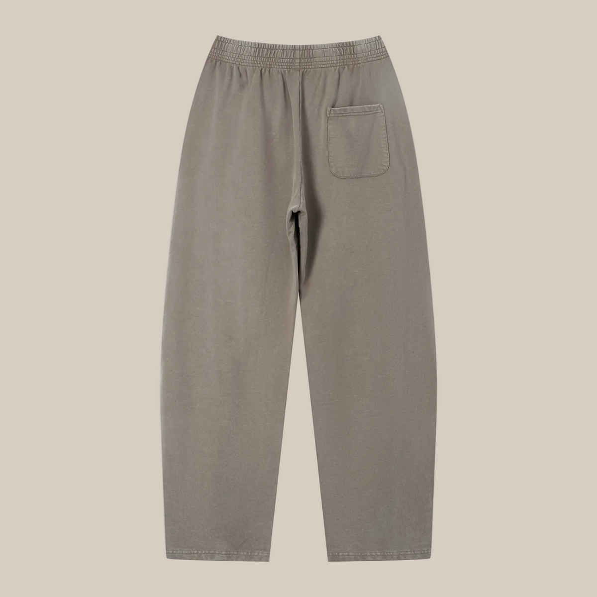 Beige pants with a pocket on a beige background