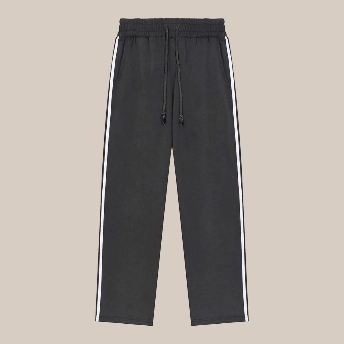 Black pants with white stripes on a beige background