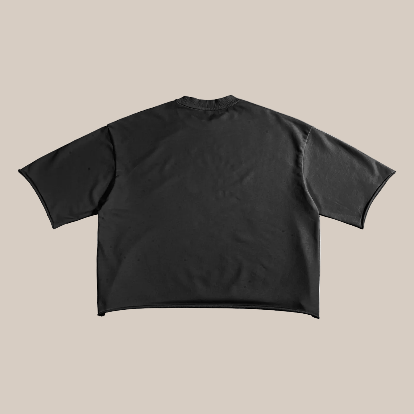 Black t-shirt on a beige background