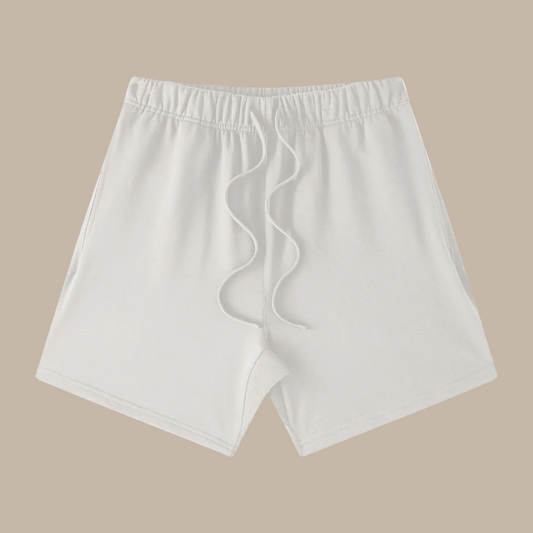 Flat lay of 425 GSM sustainable Future-Homme daily uniform loose cotton heavyweight white shorts frontside on a white background 